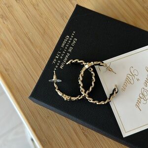 Lambskin and metal luxury earrings